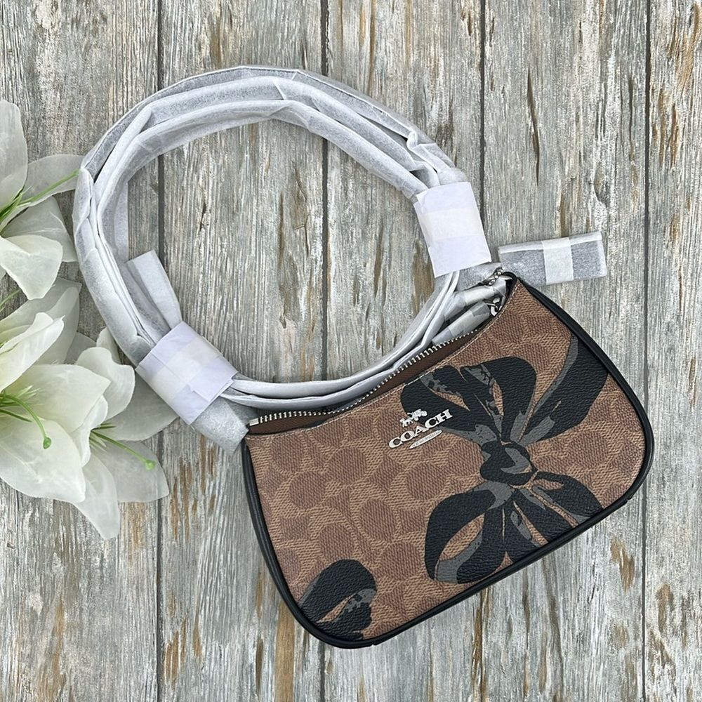 Coach Teri Mini Crossbody Bag In Signature Canvas With Bow Print Purse